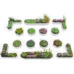 White letter-shaped planters with various plants on a white background 
