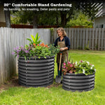 Woman gardening with large black planters filled with plants in a backyard setting. 