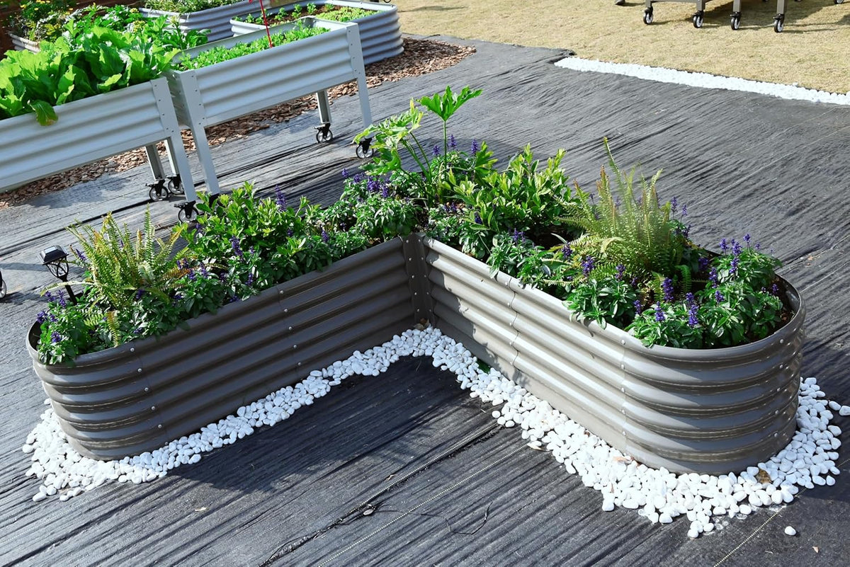 Corrugated metal garden beds with plants on a wooden deck 