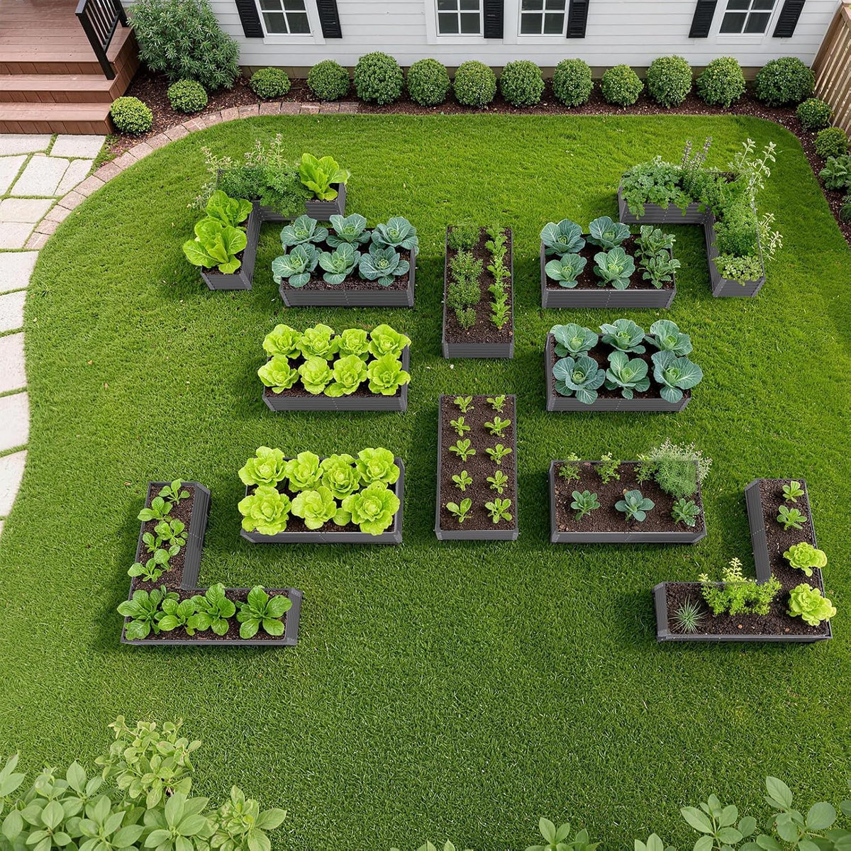 Vegetable garden with raised beds on a green lawn 