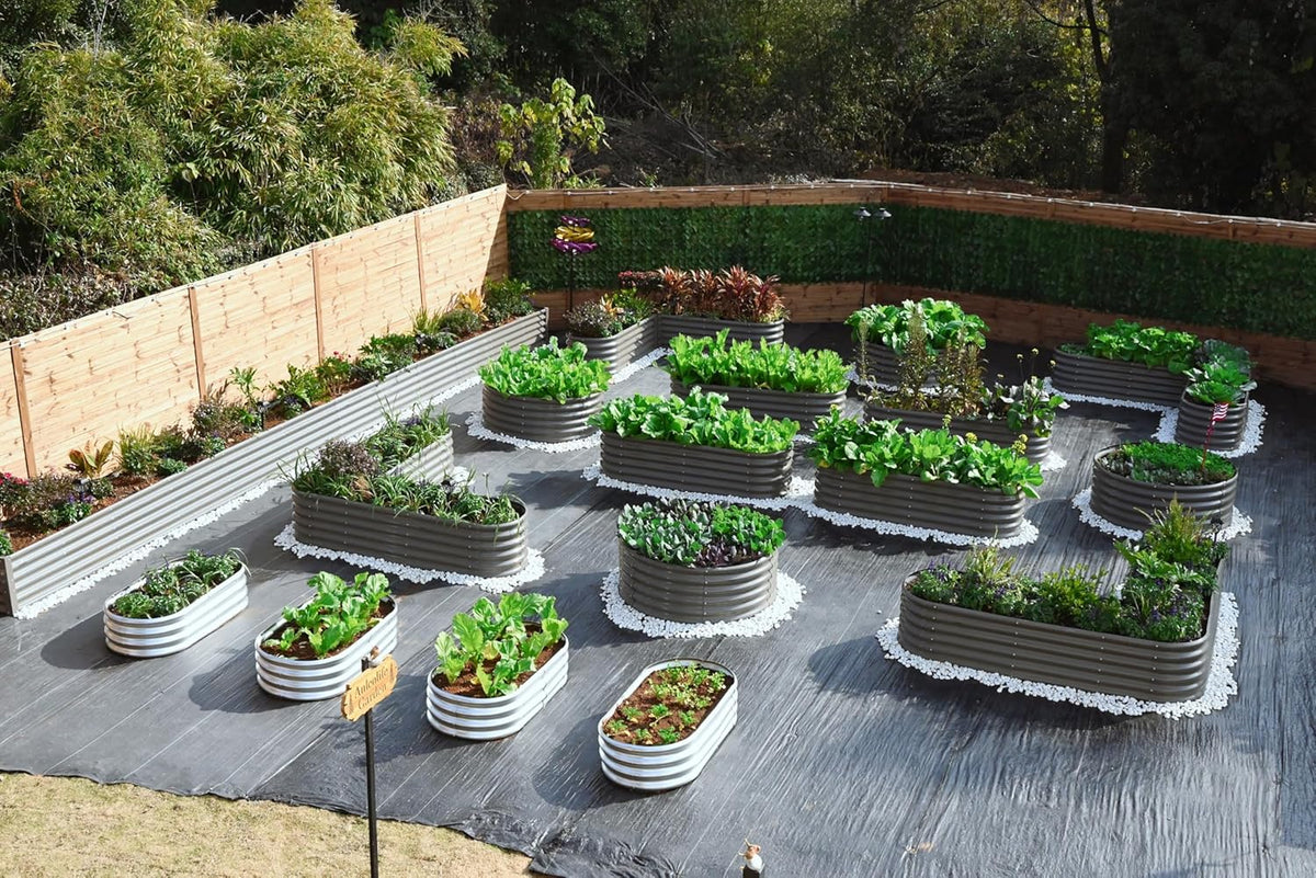 Garden with raised beds containing plants on a wooden deck 