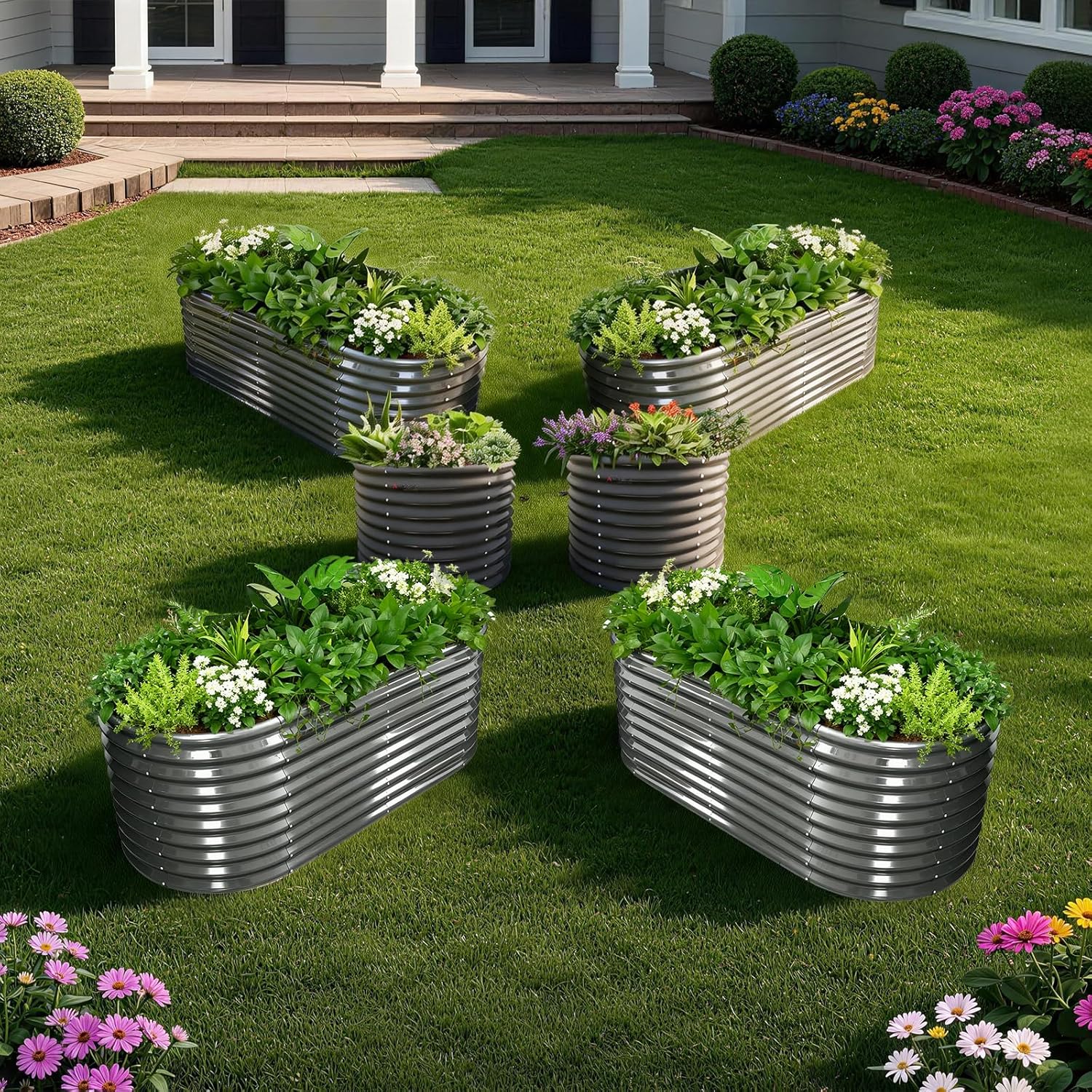 Metal garden planters with plants and flowers on a grassy lawn. 