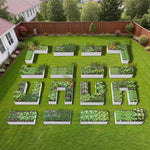 Geometric arrangement of raised garden beds filled with plants on a grassy lawn. 