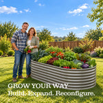 A man and woman stand on a grassy backyard next to a large galvanized corrugated metal raised garden bed filled with fresh vegetables. Text at the bottom reads, 'GROW YOUR WAY Build. 