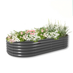 Gray metal raised garden beds with flowers on a white background